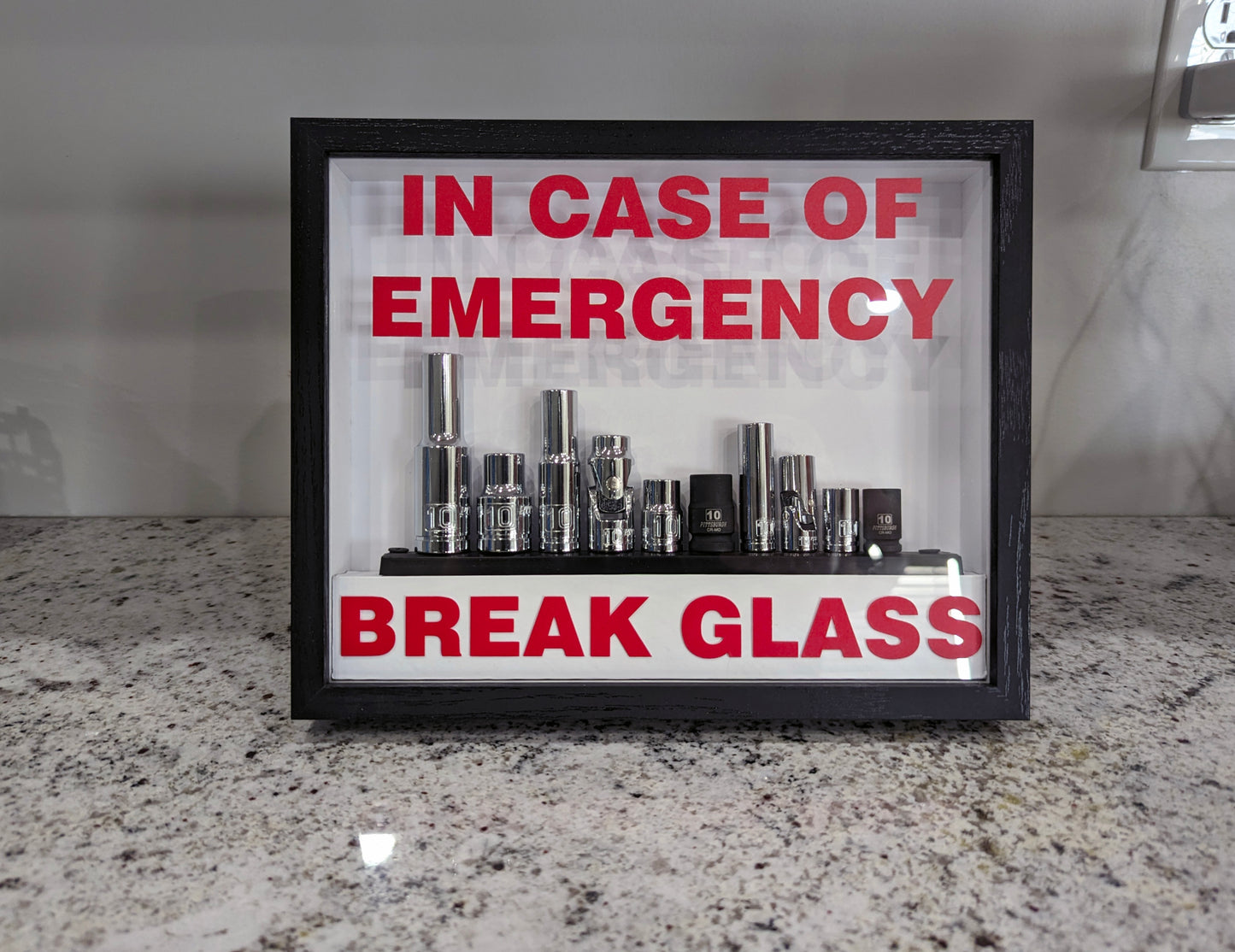 IN CASE OF EMERGENCY BREAK GLASS - 10 MM Socket Set